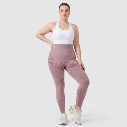 Woman wearing Sculpt 3D™ anti-cellulite leggings in pink, front view, high-waisted fit