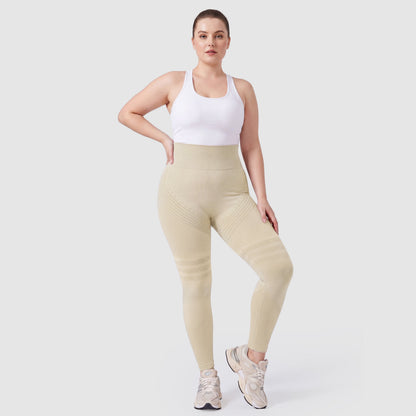 Woman wearing Sculpt 3D™ anti-cellulite leggings in beige, front view, high-waisted fit