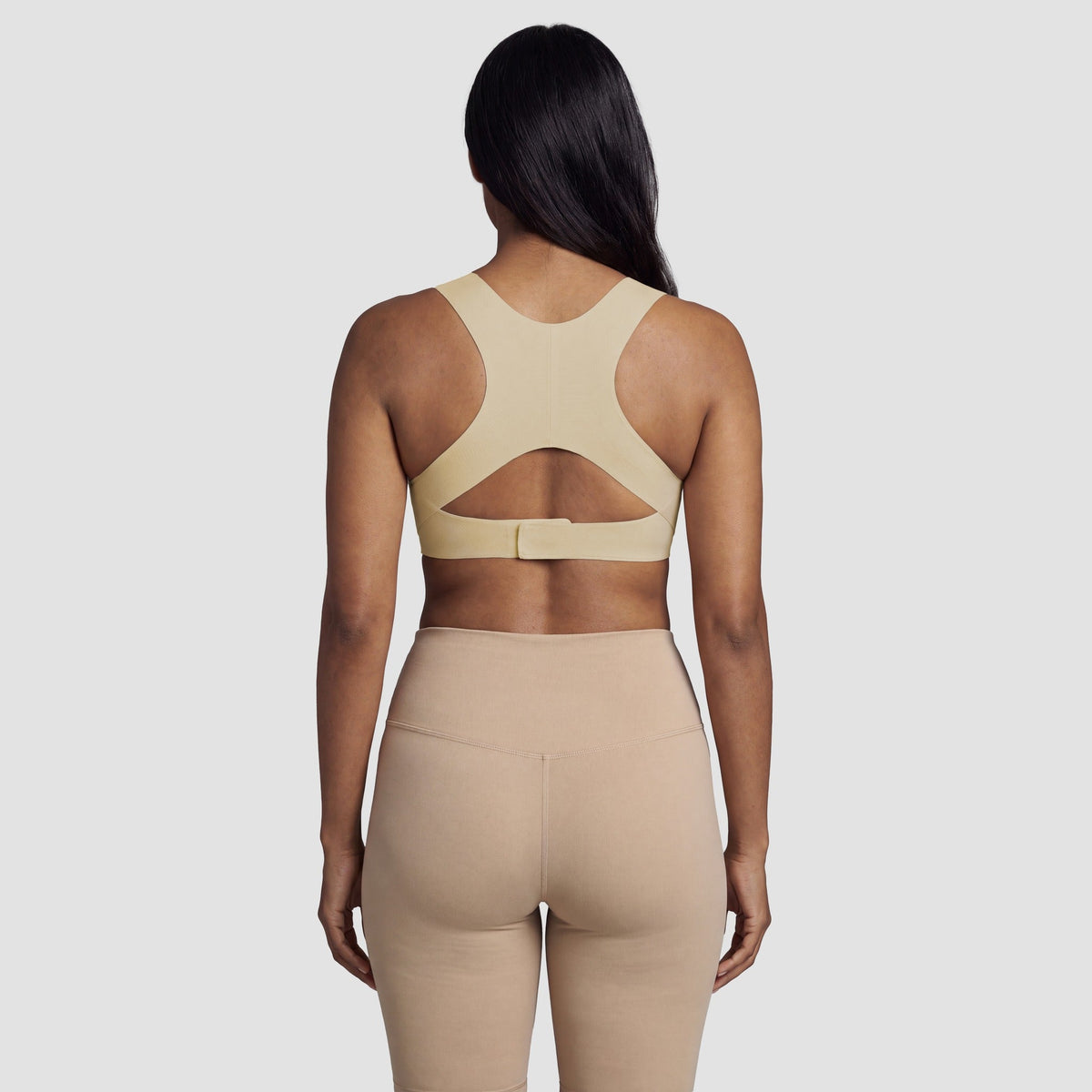 Sculpt posture bra in beige, back view of the posture-support back panel