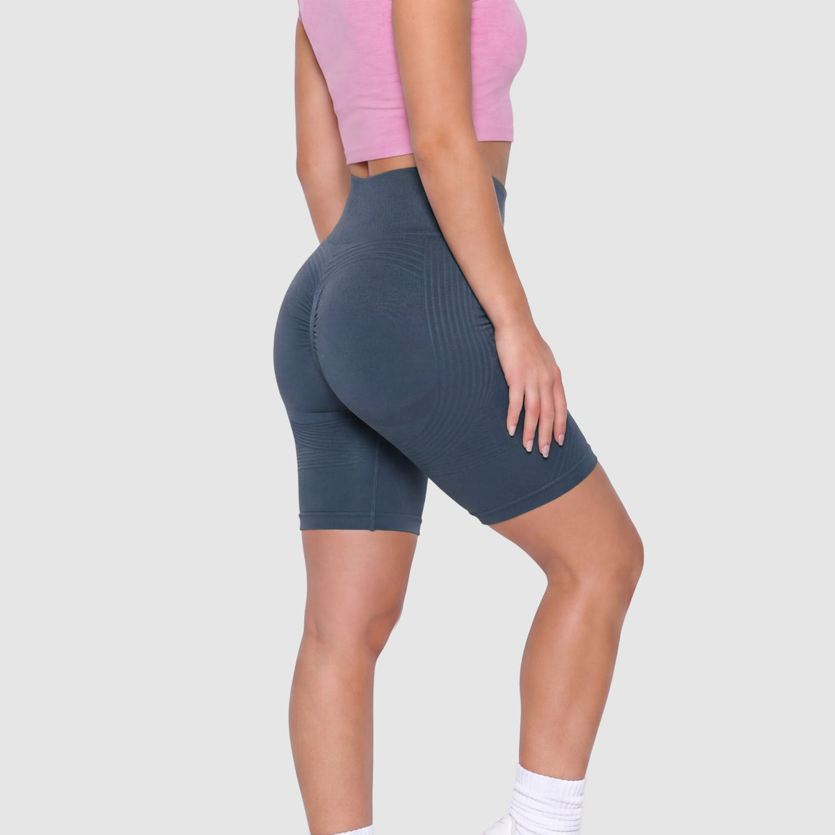 Close-up of Sculpt 3D™ anti-cellulite shorts in navy blue, side view of the lifted glute shaping